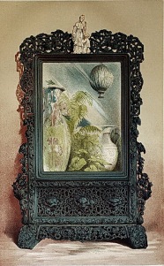 內頁3. a Chinese looking-glass in carved wood frame 中國黑檀木雕花鏡。